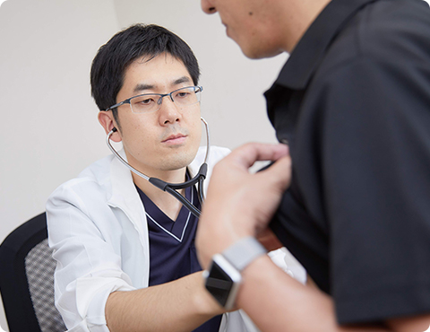 南 崇史院長、診療の様子